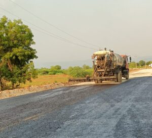 Prime coat at 618+920 LHS