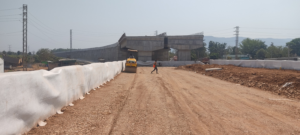 ROLLING OF SOIL BED WORK IN PROGRESS AT CH 603+027