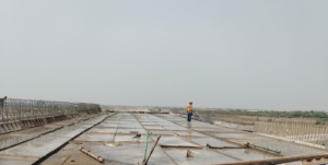 DECK SLAB CURING WORK IN PROGRESS AT CH 589+461