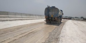 Subgrade Top Layer Watering at Ch.586+380 A1 side RE Wall