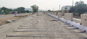 GEOSTRAP LAYING IN PROGRESS AT CH. 622+180 VUP LHS SIDE (Court Case Stretch)